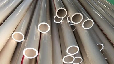 Bundle of cream CPVC plumbing pipes