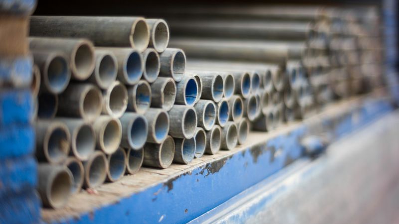 Stacks of industrial pipes ready for dispatch