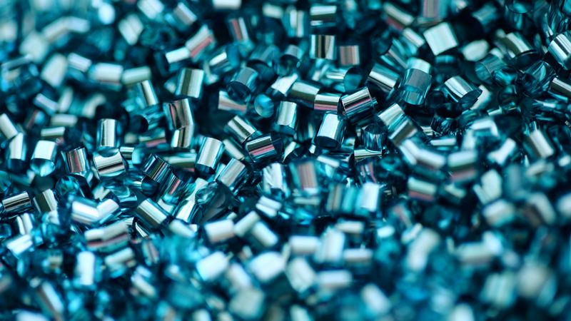 Close-up of blue PVC polymer granules